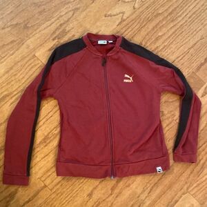 Puma size large, zip up jacket, burgundy, and black with gold puma on front